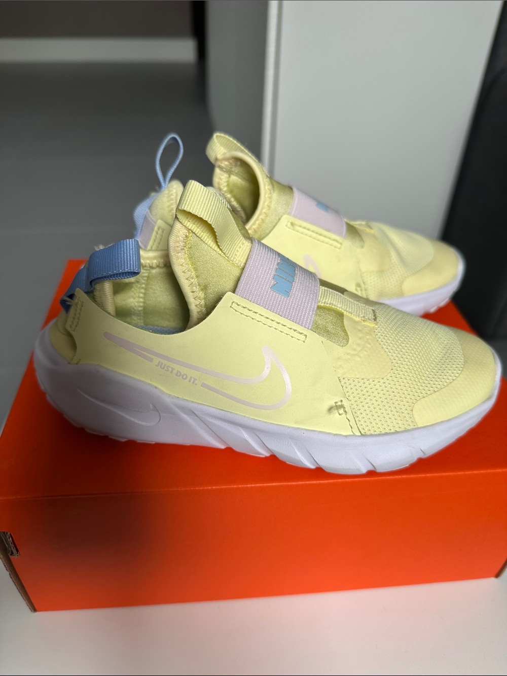 Nike Flex Plus Kids Yellow Slip-On Sneakers with Pastel Accents